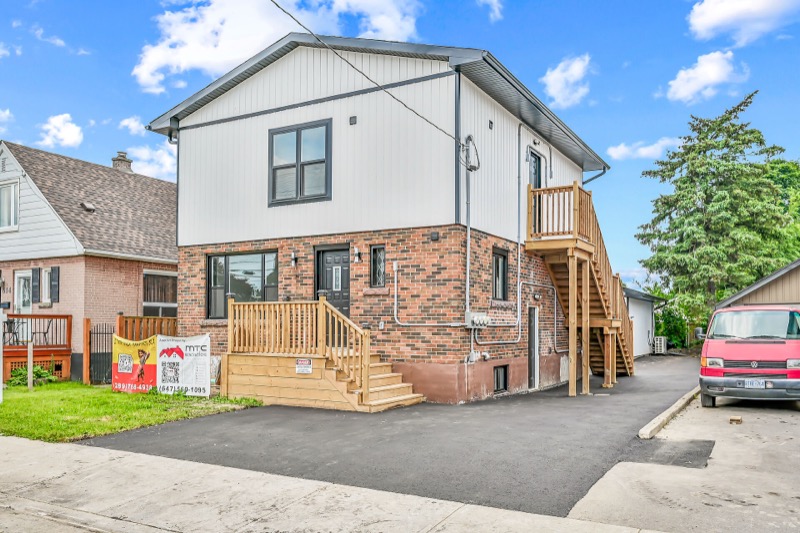 Exterior of completed multi-unit conversion at 610 Queensdale, Hamilton